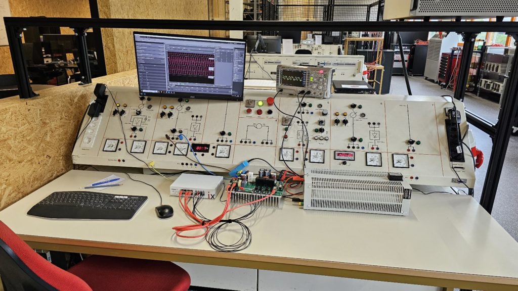 Figure 9: Table-top setup of the totem-pole PFC rectifier with a resistive load