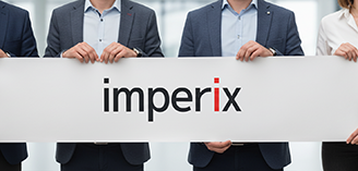 people holding banner with imperix logo