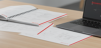 notes and a laptop on a desk