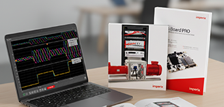 laptop and guides on a desk